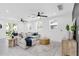 The living room is bright and open, featuring modern furnishings and plenty of natural light at 3616 W Anderson Ave, Tampa, FL 33611