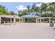 Community covered pavilion and seating area perfect for gatherings at 4320 Auston Way, Palm Harbor, FL 34685
