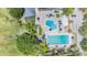 Overhead view of a pool area including a swimming pool and splash pad at 4797 Stonebriar Dr, Oldsmar, FL 34677