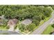 Aerial view of home with lush surrounding trees, and nice neighborhood at 4797 Stonebriar Dr, Oldsmar, FL 34677