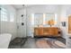 Modern bathroom with a walk-in shower, double vanity, and stylish tile work at 4797 Stonebriar Dr, Oldsmar, FL 34677