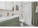 Clean bathroom featuring a modern vanity, tile shower, and neutral color scheme at 4797 Stonebriar Dr, Oldsmar, FL 34677