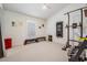 Home gym featuring weights, machines, and ample space for workouts at 4797 Stonebriar Dr, Oldsmar, FL 34677