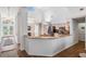 Spacious kitchen features granite counters, breakfast bar and access to other living areas at 4797 Stonebriar Dr, Oldsmar, FL 34677