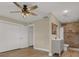 Bright bathroom with double closets, grey vanity with modern fixtures, and tiled walk-in shower at 5008 Stolls Ave, Tampa, FL 33615