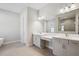Bathroom with stand up shower and a standalone tub at 5116 Wildwind Dr, Apollo Beach, FL 33572