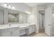 Bathroom with and sinks and a huge mirror at 5116 Wildwind Dr, Apollo Beach, FL 33572
