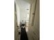Bathroom with black matt, toilet, sink, vanity, cabinet for storage at 535 31St N Ave, St Petersburg, FL 33703