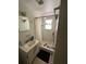 Bathroom featuring a shower with curtain, vanity, sink, and medicine cabinet at 535 31St N Ave, St Petersburg, FL 33703