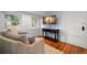 Comfortable living room features hardwood floors, a console, and abundant natural light at 535 31St N Ave, St Petersburg, FL 33703