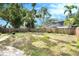 Large backyard with a well-maintained fence, and room for outdoor activities at 6024 90Th N Ave, Pinellas Park, FL 33782
