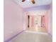 Bright and spacious bedroom with tile flooring and closet access at 6024 90Th N Ave, Pinellas Park, FL 33782