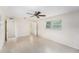 Bright bedroom with tile flooring and ceiling fan, offering ample space and natural light at 6024 90Th N Ave, Pinellas Park, FL 33782