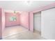 Cozy bedroom with tiled floors and closet space at 6024 90Th N Ave, Pinellas Park, FL 33782