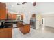 Spacious kitchen with stainless steel appliances, granite counters, and a kitchen island at 6024 90Th N Ave, Pinellas Park, FL 33782