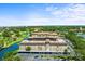 Drone view of condo and golf course in desirable location near Sarasota, Florida at 6100 Gulfport S Blvd # 114, Gulfport, FL 33707