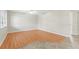 Bright living room with hardwood floors, ceiling fan and large windows at 6100 Gulfport S Blvd # 114, Gulfport, FL 33707