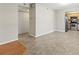 Open living space featuring a tile floor, closet, leading into the kitchen with stainless steel appliances at 6100 Gulfport S Blvd # 114, Gulfport, FL 33707