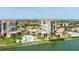 Beautiful aerial view of the community with a pool and beach access at 6322 Palma Del Mar Blvd S # 604, St Petersburg, FL 33715