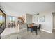 Cozy condo living room with view to the dining area and bright kitchen at 6322 Palma Del Mar Blvd S # 604, St Petersburg, FL 33715
