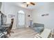 Bright playroom featuring hardwood floors, a window, play furniture and gaming accessories for entertainment at 6519 Twin Bridges Dr, Zephyrhills, FL 33541