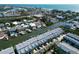 Beautiful aerial view of waterfront townhomes with boat docks and easy access to the bay and gulf beaches at 659 Garland Cir, Indian Rocks Beach, FL 33785