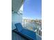 Balcony view of water with a stylish lounge chair, perfect for relaxing and enjoying the outdoors at 659 Garland Cir, Indian Rocks Beach, FL 33785