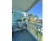 Cozy balcony featuring seating and a peaceful canal view for enjoying relaxing moments and nature at 659 Garland Cir, Indian Rocks Beach, FL 33785