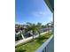 Breathtaking water view of the canal from the balcony, ideal for enjoying the tropical scenery and wildlife at 659 Garland Cir, Indian Rocks Beach, FL 33785