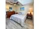Bedroom with a vaulted ceiling, neutral decor, and a cozy atmosphere at 659 Garland Cir, Indian Rocks Beach, FL 33785