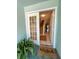 Bright foyer with tiled floors, a staircase, and a welcoming Beach House door mat at 659 Garland Cir, Indian Rocks Beach, FL 33785