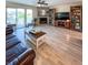 Comfortable living room with a fireplace, modern furnishings, and a view of the water at 659 Garland Cir, Indian Rocks Beach, FL 33785