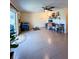 Spacious living area with tile flooring, leading to a backyard patio area at 659 Garland Cir, Indian Rocks Beach, FL 33785