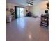 Spacious living room with tile floors, leading to a backyard patio area at 659 Garland Cir, Indian Rocks Beach, FL 33785