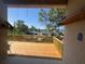 The wooden balcony overlooks a canal with picturesque views of the neighborhood at 7330 New York Ave, Hudson, FL 34667