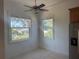 Bright dining area with natural light and neighborhood views at 7330 New York Ave, Hudson, FL 34667