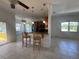 Open kitchen with breakfast bar seating at 7330 New York Ave, Hudson, FL 34667