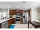Eat-in kitchen featuring stainless steel appliances and a neutral color palette at 816 College Chase Dr, Ruskin, FL 33570
