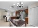 Eat-in kitchen featuring stainless steel appliances, granite countertops, and bright lighting at 816 College Chase Dr, Ruskin, FL 33570