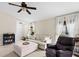 Welcoming living room with tile floors, high ceilings, and ample natural light at 816 College Chase Dr, Ruskin, FL 33570