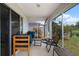 Relaxing screened patio with comfortable seating and scenic water view at 816 College Chase Dr, Ruskin, FL 33570