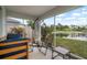 Relaxing screened patio with comfortable seating and scenic water view at 816 College Chase Dr, Ruskin, FL 33570