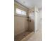 Updated tile shower with a neutral design and built in storage at 816 College Chase Dr, Ruskin, FL 33570