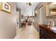 Inviting hallway with decorative tile flooring, leading into the home's spacious living areas and a glimpse of the backyard at 8315 W Elm St, Tampa, FL 33615
