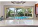 Kitchen sink with views of the backyard and pool at 8315 W Elm St, Tampa, FL 33615