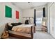 Cozy bedroom with a sports theme and ample natural light at 8413 Swiss Chard Cir, Land O Lakes, FL 34637