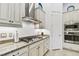 Modern kitchen featuring stainless steel oven and gas cooktop at 8413 Swiss Chard Cir, Land O Lakes, FL 34637