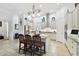Spacious kitchen featuring a granite island with seating and stainless appliances at 8413 Swiss Chard Cir, Land O Lakes, FL 34637