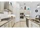 Well-appointed kitchen featuring tile floors, stainless appliances, and decor at 8413 Swiss Chard Cir, Land O Lakes, FL 34637
