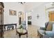 Inviting living room showcasing archways, tile flooring, and elegant decor at 8413 Swiss Chard Cir, Land O Lakes, FL 34637